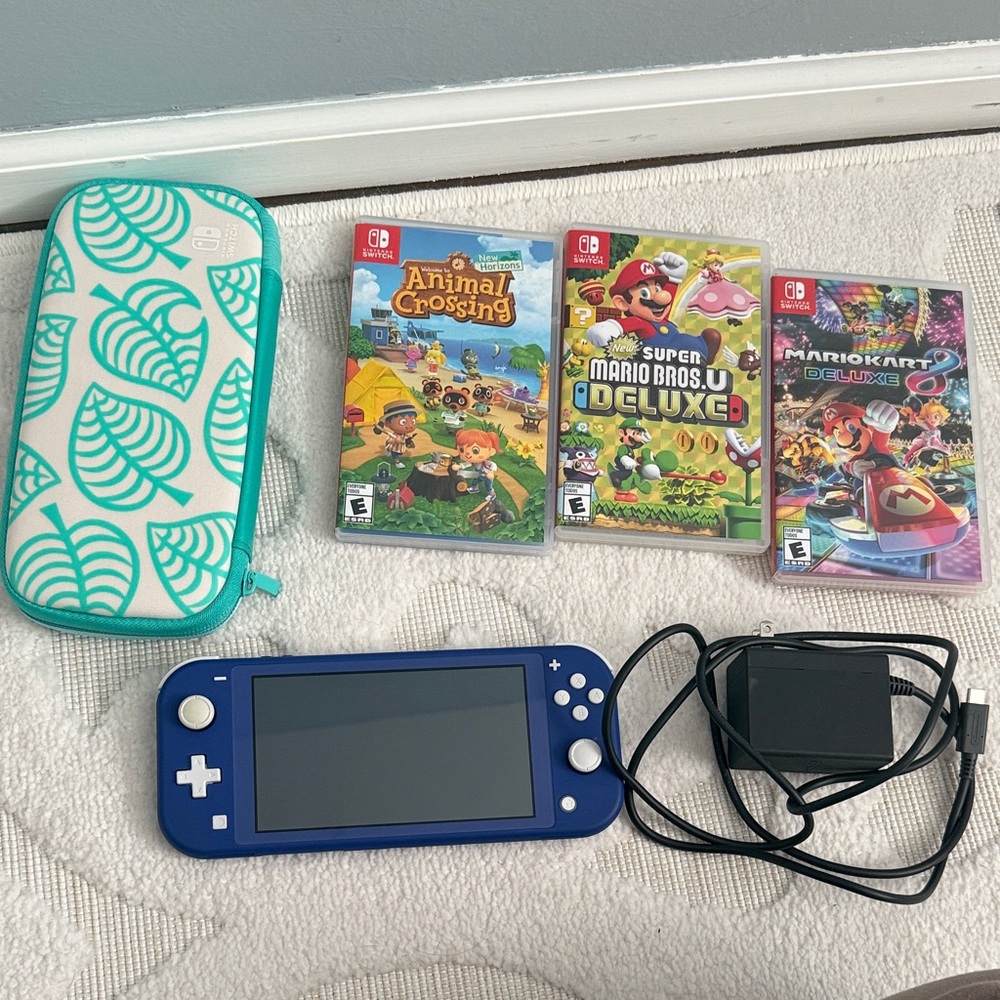 Nintendo Switch Lite in Blue with Game Collection